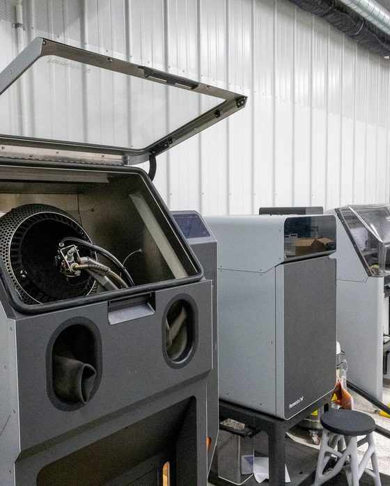 Formlabs Fuse SLS printer with its blast cabinet open
